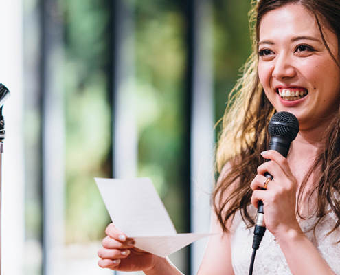 Girl making speech with microphone experiencing social anxiety