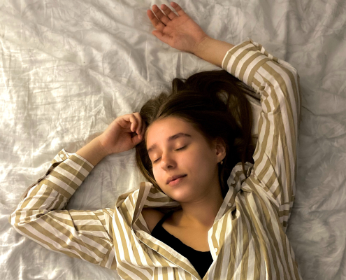 Woman sleeping on bed